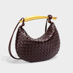 sculpted handle handbag