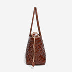 women_s woven leather purse